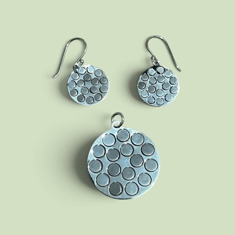 Dije y aretes Circulos