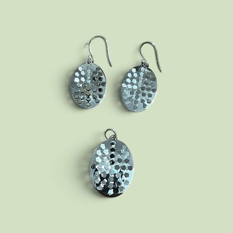 Dije y aretes Ovalo